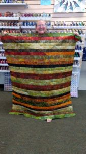 Jelly Roll Race quilt created by Kristine