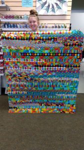 Jelly Roll Race quilt created by Laina