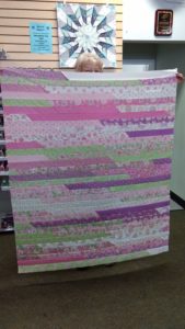 Jelly Roll Race quilt created by Sandy