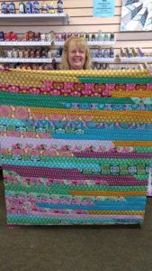Jelly Roll Race quilt created by Dana