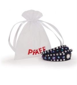 Photo of white bag with PFAFF in red and Swarovski bracelets that are to be given as pre-order gifts for PFAFF®Creative ICON