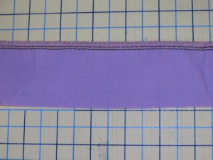 Photo of four thread overlock stitches to gather fabric using a serger