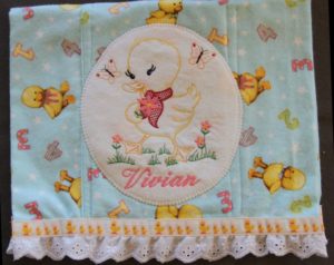 Photo of embroidered flannel burp cloth with applique