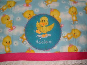 Photo of embroidered flannel burp cloth with applique
