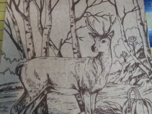 Photo of printed fabric of line drawing of deer. Printed on marbled cotton printable fabric