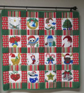 Photo of completed Mylar Embroidery Wall Hanging from Anita Goodesign's Mylar Christmas