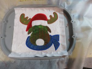 Photo of Christmas Moose with Mylar embroidery for antlers, hat and scarf and head
