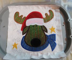 Photo of completed Mylar embroidery Christmas Moose