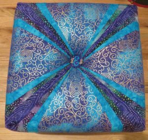 Purple and teal square tuffet