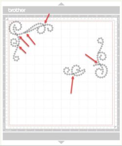 Problem areas indicated by red arrows where rhinestones are overlapping or too close together