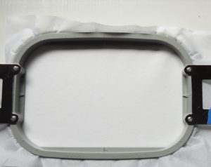 Photo of hooped tear away stabilizer for iron-on patches