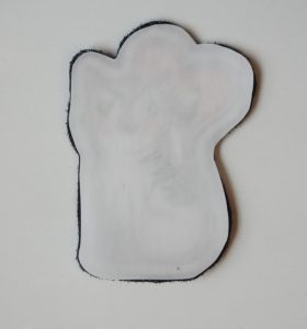 Photo of patch placed under iron-on adhesive