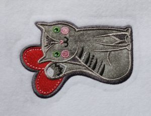 Photo of completed cat applique for iron-on patch