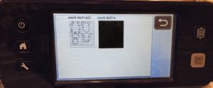 Photo of ScanNCut screen showing appliqué cut file on USB stick