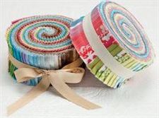 Photo of two jelly roll bundles of pre-cut fabric strips