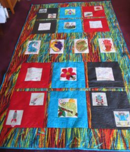Photo of Quilt made from various Anita Goodesign collections 