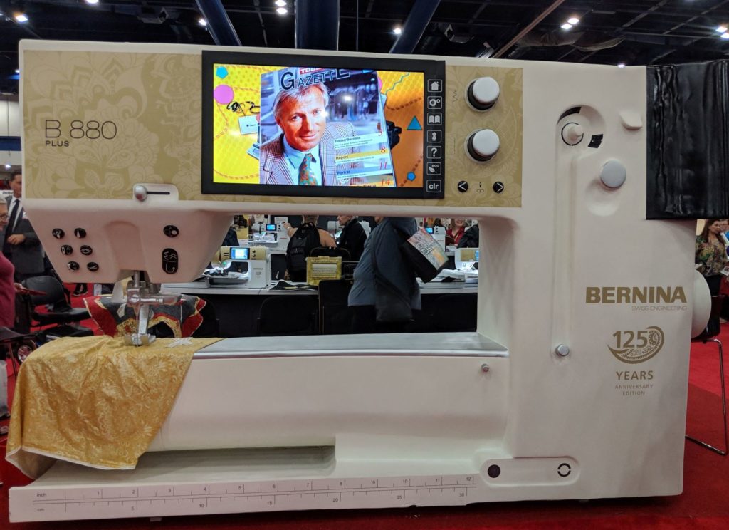Photo of giant sewing machine at the Bernina booth at the 2018 International Quilt Festival