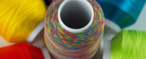 close up of spools of quilting thread