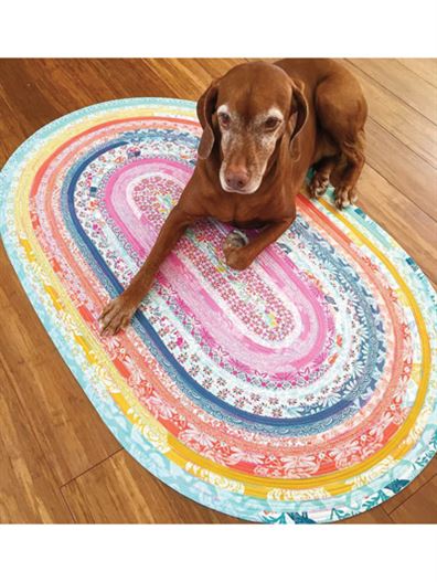 Photo of dog on jelly roll rug to make in class at the Colorado Springs store one of May events