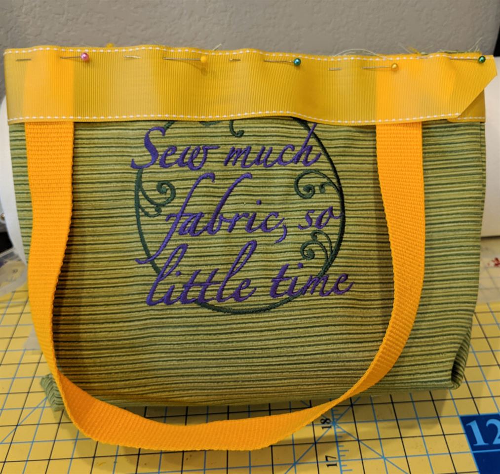 Photo of ribbon pinned to top of bag