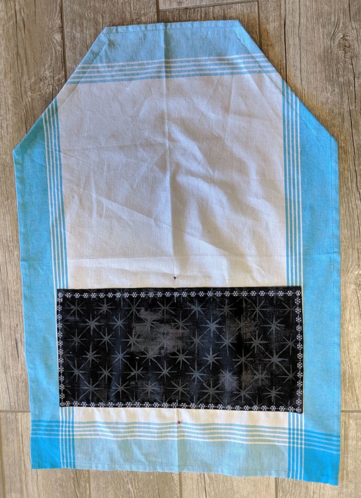 Photof pocket stitched to tea towel with decorative stitching