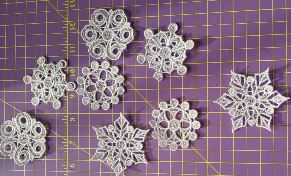 Photo of free standing lace snow flakes for Holiday Wreath