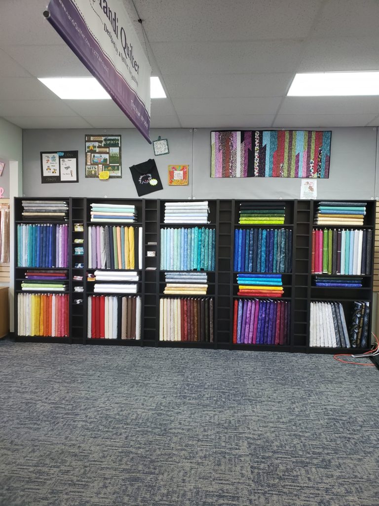 Photo of fabric shelves at RMSV Aurora store