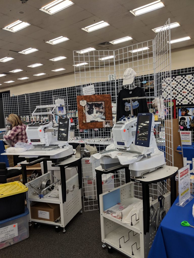 photo of 10 needle machines set up at Sewing Expo one of March Events
