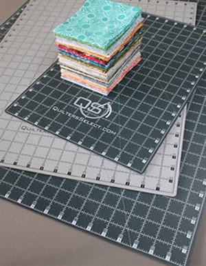 Photo of three Quilters Select cutting mats of different sizes