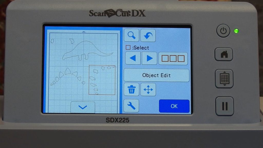 Screen shot of ScanNCut SDX225 moving applique elements to fit on 12" x 12" mat