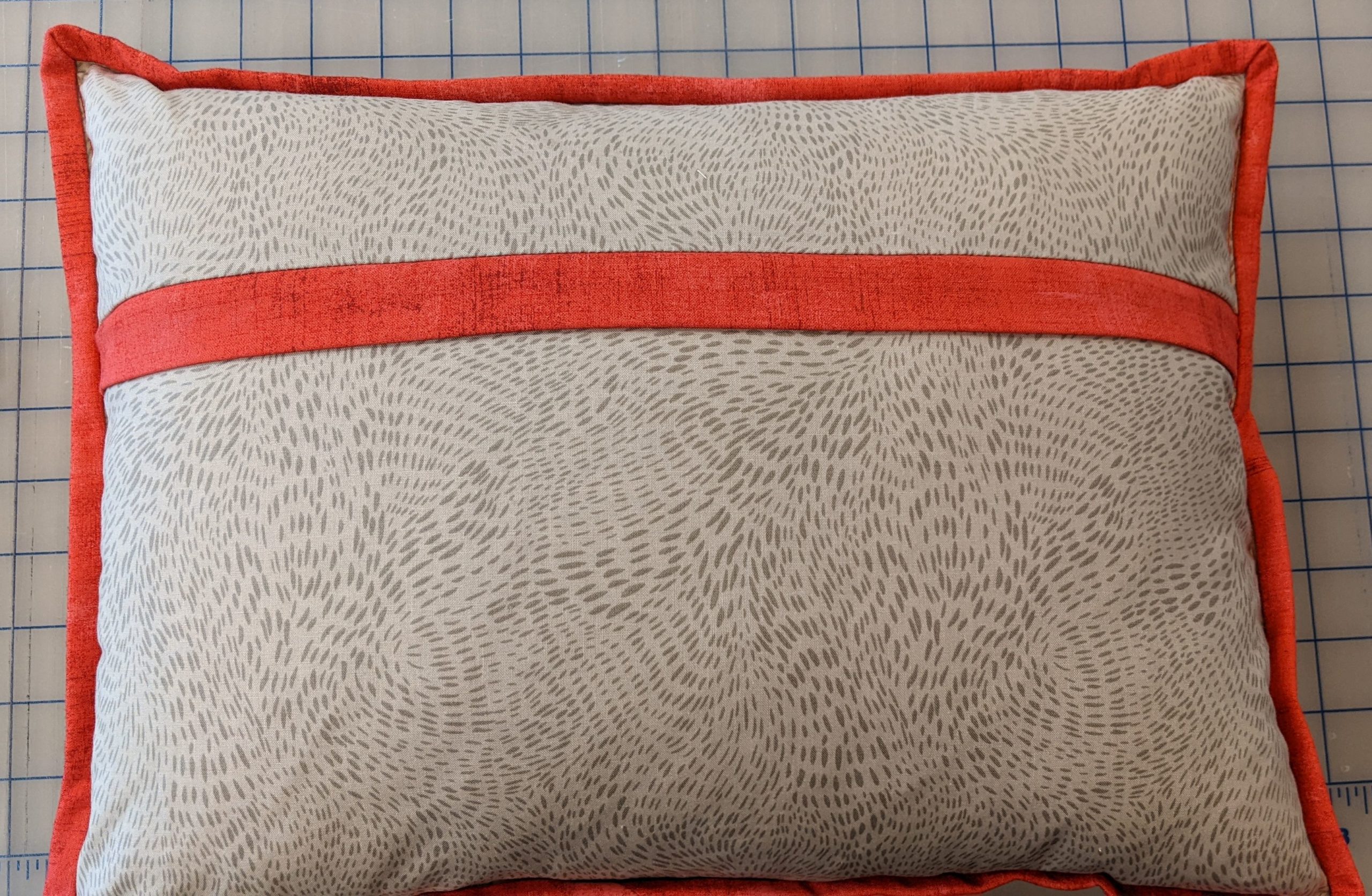 Zipper flap in contrasting fabric
